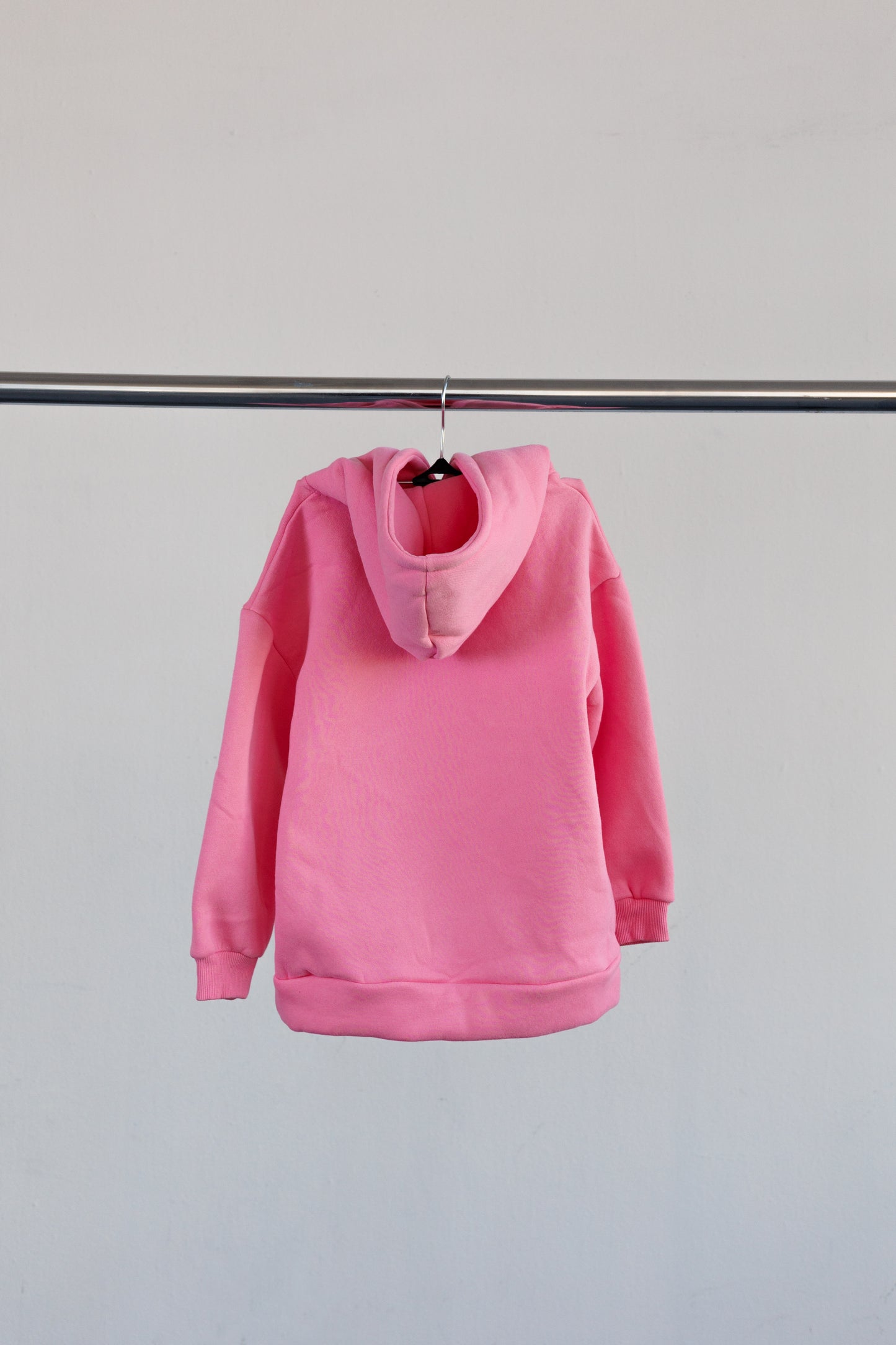 Hanging pink jogger top